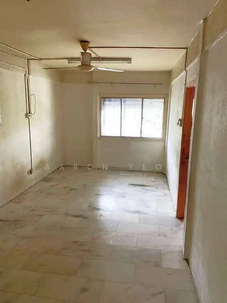 Room features: white painted walls, marble flooring, ceiling fan, window with view, door, light switch, power outlet.