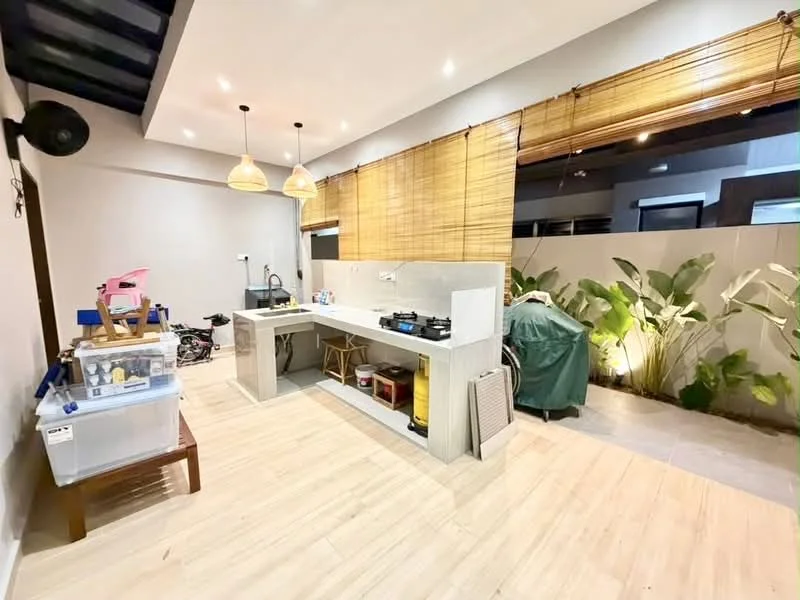 Kitchen features: white cabinetry, grey countertop, built-in gas stove, extraction hood, pendant lighting, wooden dining table, tile flooring, bamboo window treatment, greenery visible outside, open layout; style: modern; view: garden.