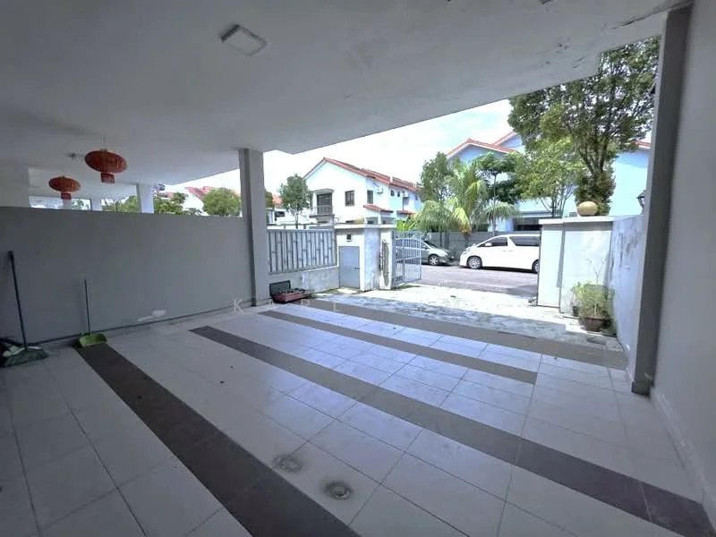 Exterior type: car porch; features: paved flooring with tiles, grey painted walls, open entrance, manicured landscaping with plants, visible street view, security gate, surrounding residential buildings; style: modern.