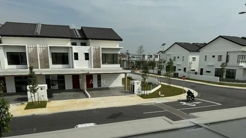 Exterior type: linked terrace house; features: white painted facade, flat roof, two-storey building, manicured lawn, paved walkway, street parking, solar panels on roof, modern architectural design, surrounded by greenery, driveway with interlocking pavers; style: modern.