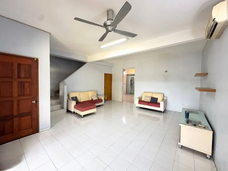 Living features: white painted walls, glossy white tile flooring, 5-blade ceiling fan with light, two 2-seater fabric sofas in cream and red, glass coffee table, built-in wall shelf, air conditioning unit, staircase leading to upper floor; style: modern.