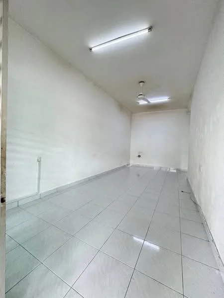 Room features: white painted walls, glossy ceramic tile flooring, ceiling with fluorescent lights, 1 ceiling fan, no visible windows, empty space; style: minimalist.