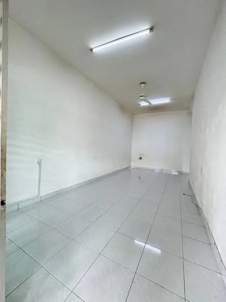 Room features: white painted walls, glossy ceramic tile flooring, ceiling with fluorescent lights, 1 ceiling fan, no visible windows, empty space; style: modern.