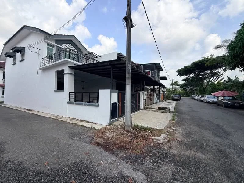 Exterior type: linked terrace house; features: white painted facade, flat roof, two-storey building, covered car porch, manicured lawn, paved walkway, surrounded by greenery, street view with parked cars; style: modern.