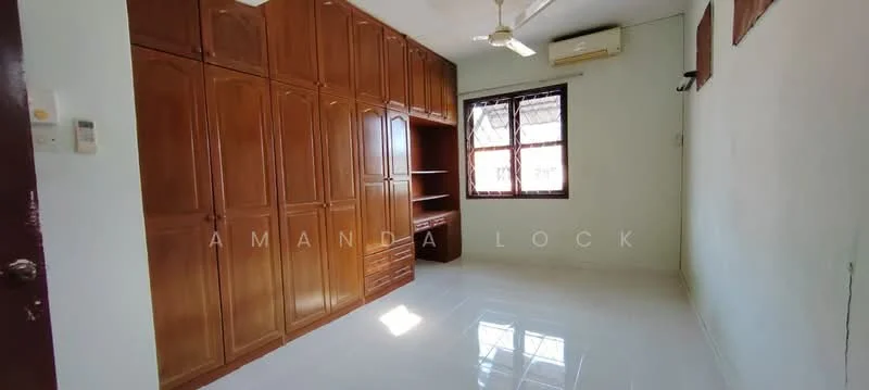Bedroom features: built-in wooden wardrobe with multiple doors, white tiled flooring, ceiling fan, window with wooden frame, air conditioning unit, neutral wall color, shelving unit, natural light from window.