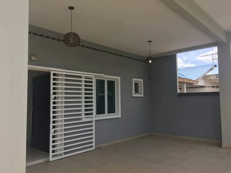 Room features: grey painted walls, sliding glass door, floor-to-ceiling windows, hanging pendant light, tile flooring, outdoor view, ceiling with recessed lighting; style: modern; view: garden.