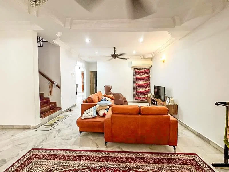 Living features: orange fabric sectional sofa, 2-seater fabric sofa in beige, coffee table, wall-mounted TV, TV console, area rug with intricate pattern, ceiling fan with light, recessed downlights, white painted walls, marble flooring, decorative wall hanging, staircase visible in background; style: modern.