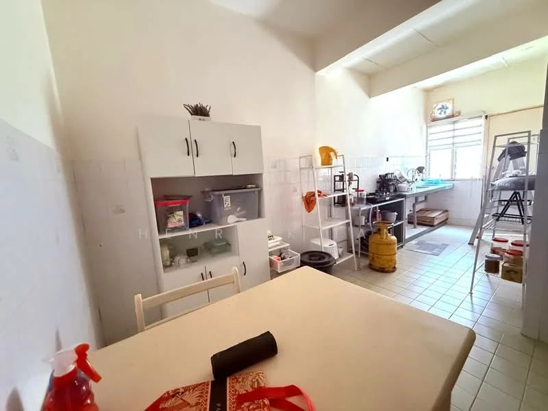 Kitchen features: white painted walls, tile flooring, kitchen cabinets, countertop, window with natural light, gas cylinder, kitchen appliances, table, chairs, shelves, sink.