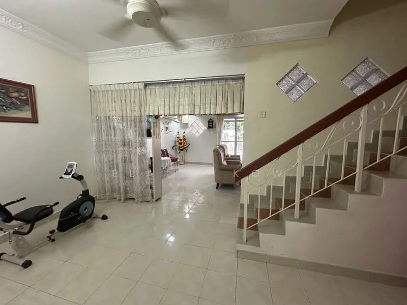 Room features: white painted walls, glossy tile flooring, ceiling fan, staircase with white railing, exercise bike, curtains with floral pattern, decorative wall art, natural light from windows; style: modern.