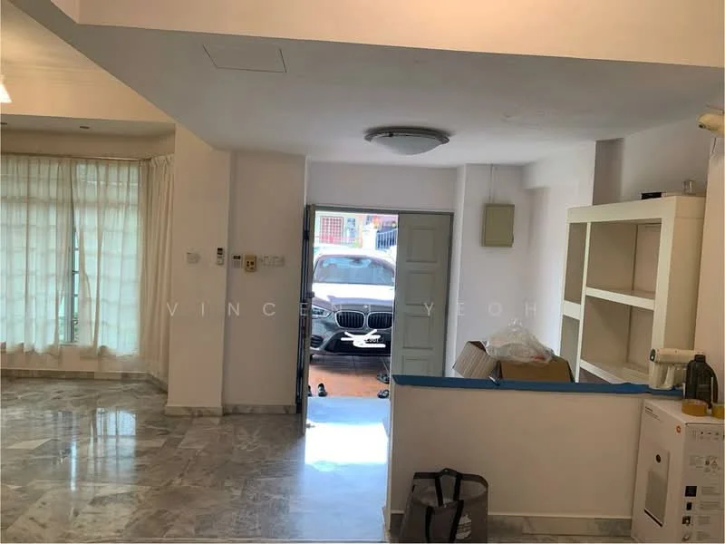 Room features: marble flooring, white painted walls, ceiling light fixture, door leading outside, window with sheer curtains, built-in cabinet, box of items, open space layout.