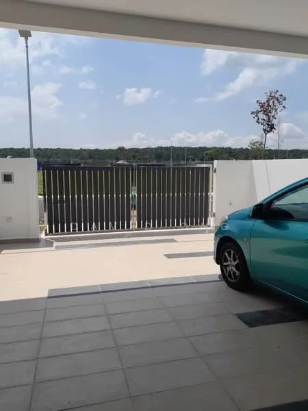 Exterior type: car porch; features: paved driveway, metal gate, landscaped area, surrounding greenery, single-storey structure, outdoor lighting; style: modern.