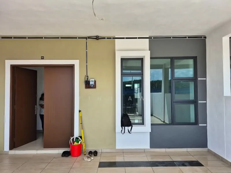 Room features: cream painted walls, grey painted wall, white window frames, floor-to-ceiling windows, tiled flooring, door with wood finish, wall-mounted electrical panel, cleaning supplies, backpack, light fixtures, visible outdoor view; style: modern.