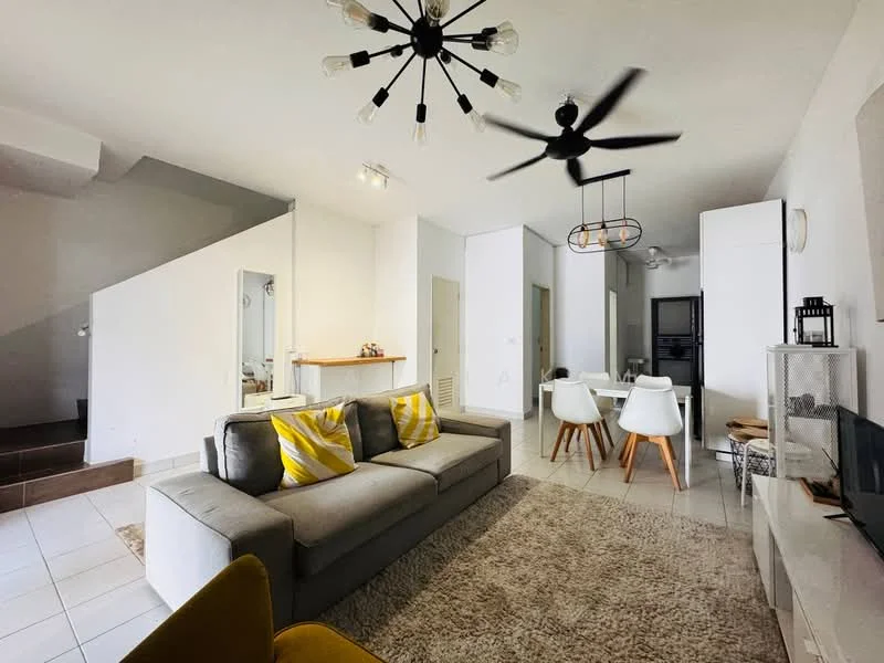 Living features: 3-seater grey fabric sofa, yellow accent cushions, area rug with neutral color, ceiling fan with 5 blades, pendant light fixture, wall-mounted TV, coffee table, white walls, tile flooring, open layout, decorative wall clock, dining area visible in background; style: modern.