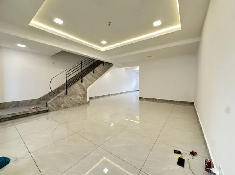 Room features: white painted walls, polished marble tile flooring, tray ceiling with recessed lighting, staircase with metal railing, large open space, no visible furniture, neutral color scheme, floor-to-ceiling windows, multiple light fixtures; style: modern.