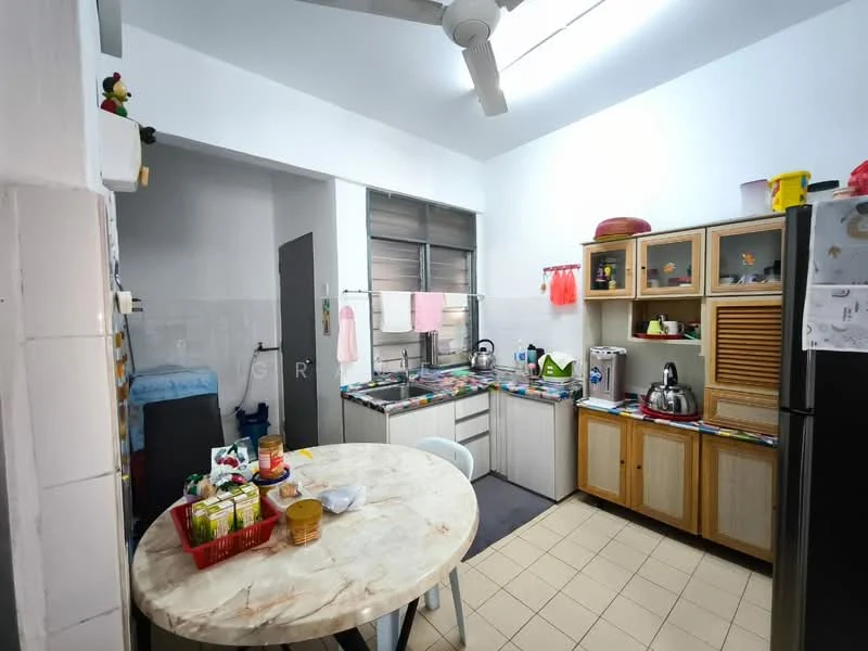 Kitchen features: white painted walls, tile flooring, ceiling fan, marble dining table, wooden cabinetry, stainless-steel sink, chrome pull-down faucet, built-in oven, freestanding fridge, kettle, toaster, microwave, colorful dish towels, open shelving, countertop with various kitchen items; style: modern.