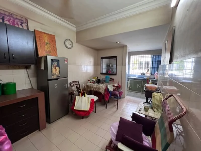 Kitchen features: white tiled walls, cream tiled flooring, black cabinetry, stainless-steel fridge, wooden dining table, red upholstered dining chairs, wall clock, window with metal grille, sink with faucet, countertop with storage below.