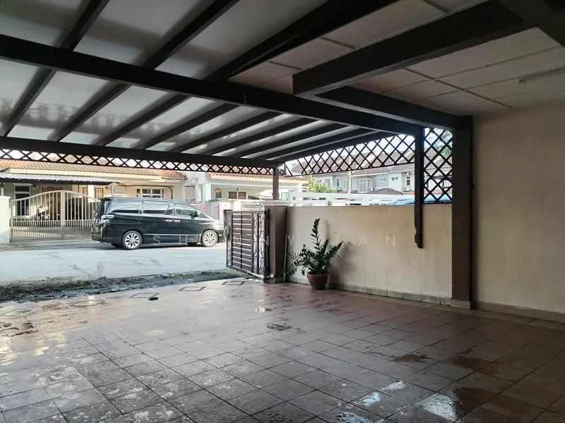 Exterior type: car porch; features: covered car porch with lattice roof, tiled flooring, potted plant, open space for vehicle parking, surrounding residential area, driveway with interlocking pavers; style: modern.