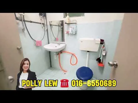 Bathroom features: white ceramic sink, chrome basin mixer faucet, white toilet, orange plumbing pipe, light blue wall tiles, light blue floor tiles, grab bars, shower head, shower curtain rod.