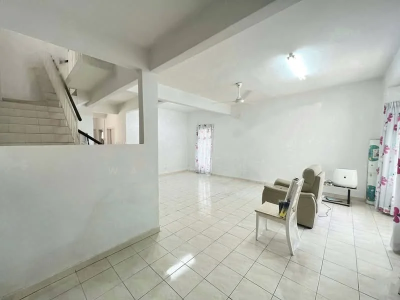 Living features: white painted walls, glossy ceramic tile flooring, ceiling fan, large windows with sheer curtains, two beige armchairs, small white side table, water dispenser, staircase in background; style: modern.