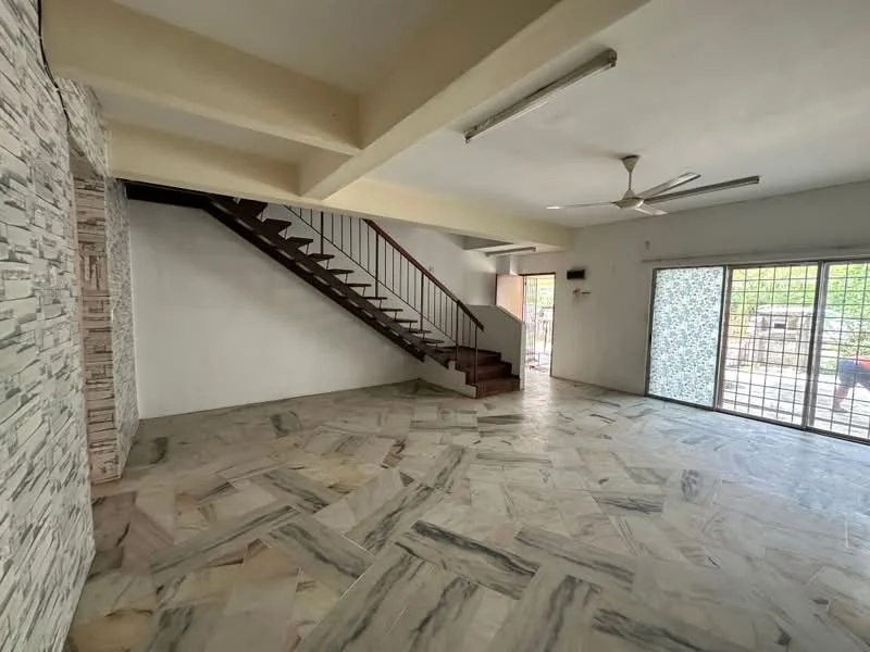 Living features: marble flooring, exposed brick accent wall, ceiling fan, large windows with grid pattern, staircase leading to upper floor, open layout, natural light, neutral wall color; style: modern.
