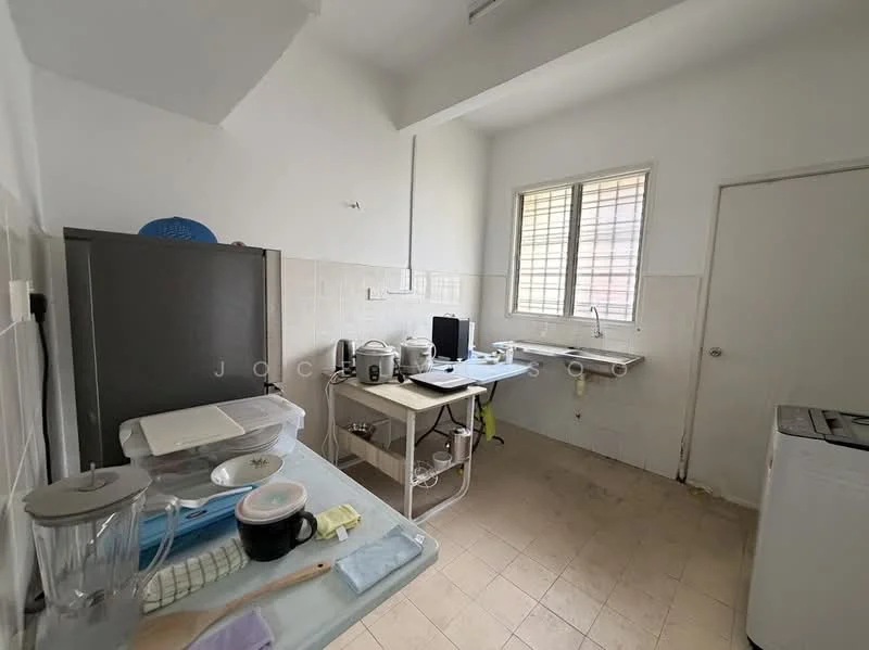 Kitchen features: white painted walls, tile flooring, single-bowl stainless-steel sink, chrome pull-down faucet, white countertop, built-in cabinets, refrigerator, microwave, blender, toaster, kettle, washing machine, window with grid, table with chairs.