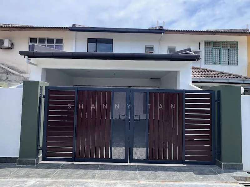 Exterior type: semi-detached house; features: white painted facade, dark wood slatted gate, grey stone-paved driveway, flat roof, green accent wall, visible air conditioning units, manicured landscaping, single-storey, modern design; style: modern.