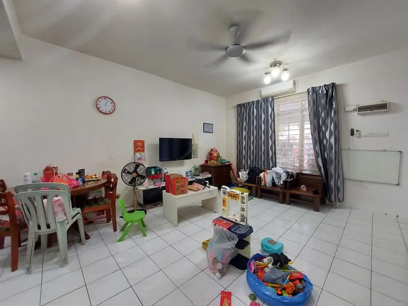 Living features: white painted walls, tiled flooring, 5-blade ceiling fan with light, recessed downlights, wall-mounted TV, wooden sideboard, dining table with chairs, green plastic chair, decorative wall clock, curtains with pattern, air conditioning unit, toys scattered on the floor, coffee table, storage boxes.