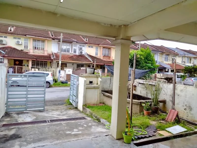 Exterior type: linked terrace house; features: concrete driveway, metal gate, manicured lawn, paved walkway, surrounding residential houses, visible air conditioning units, fenced yard, garden area with potted plants; style: modern.