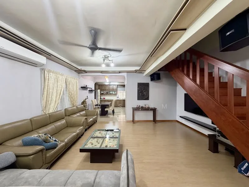 Living features: 5-blade ceiling fan with light, wall-mounted TV, L-shape sectional sofa in beige, coffee table with decorative elements, wooden staircase, cream curtains, laminate flooring, recessed downlights, wall-mounted speakers; style: modern. Kitchen features: open-plan kitchen, kitchen island, stainless-steel appliances, cabinets with wood finish, tile backsplash, countertop with decorative items; style: modern.
