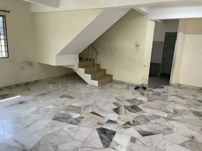 Room features: marble flooring, white painted walls, staircase with metal railing, exposed ceiling beams, large window, corner wall with different paint color, light source from window.