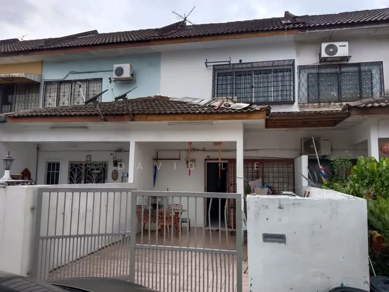 Exterior type: linked terrace house; features: two-storey building, white painted facade, brown tiled roof, metal gate, front porch with tiled flooring, visible air conditioning units, window grilles, outdoor seating area, manicured plants, balcony on the upper floor; style: modern.