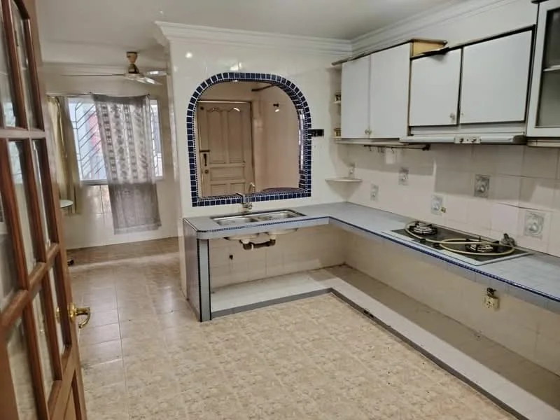 Kitchen features: single-bowl stainless-steel sink, chrome faucet, 2-burner gas hob, white cabinetry with glass-front upper cabinets, blue tiled backsplash, white tiled walls, light-colored tile flooring, ceiling fan, arched entryway, window with sheer curtains, countertop with blue trim; style: modern.