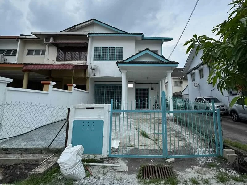 Exterior type: semi-detached house; features: white painted facade, blue accent trim, gated entrance, fenced front yard, paved driveway, two-storey structure, front porch with overhang, windows with grilles, manicured lawn, surrounded by residential area; style: modern.