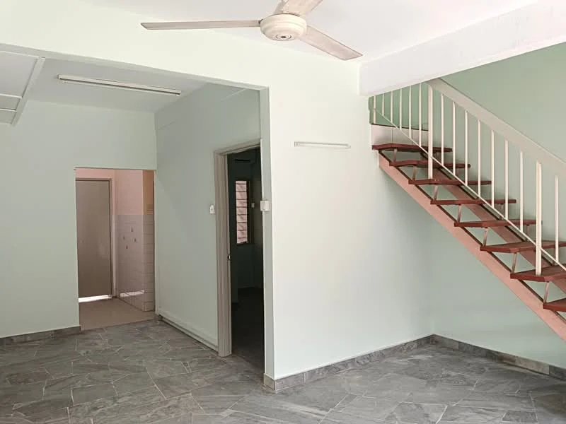 Room features: light green painted walls, grey marble tile flooring, ceiling fan, staircase with wooden steps, open layout, doorway leading to another room, window with natural light, no visible furniture; style: modern.