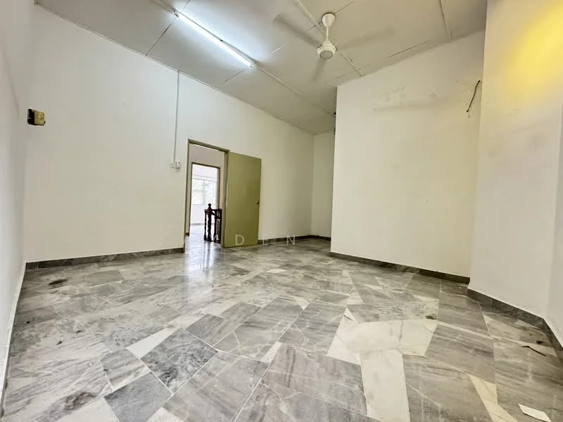Room features: marble flooring, white painted walls, ceiling fan, doorway leading to another room, natural light from doorway.