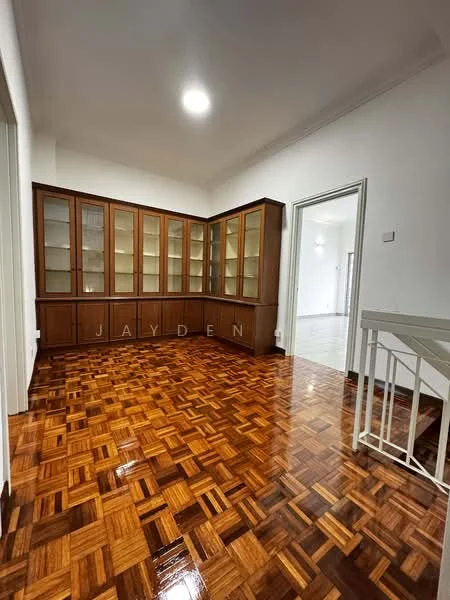 Room features: parquet wood flooring, white painted walls, built-in wooden cabinetry with glass doors, recessed ceiling lights, doorway leading to another room, staircase railing; style: modern.