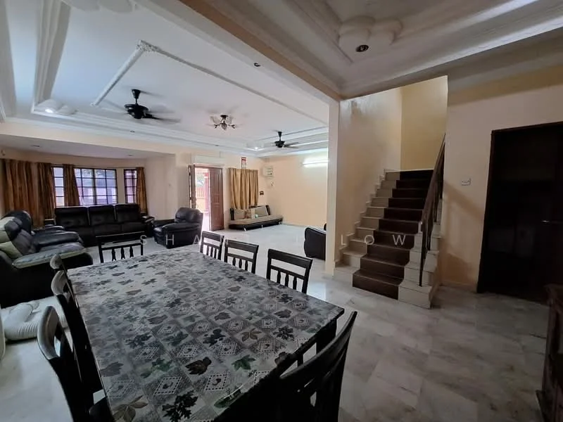 Living features: marble tile flooring, tray ceiling with recessed lighting, 5-blade ceiling fan, large windows with sheer curtains, two-tone wall paint, sofa set in black leather, coffee table, TV console, area rug, dining table with patterned tablecloth, wooden dining chairs; style: modern. Staircase features: wooden staircase, white painted walls, handrail, natural light from nearby window.