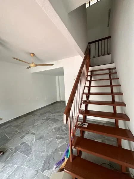 Room features: staircase with wooden handrail, grey stone flooring, white painted walls, ceiling fan, natural light from upper window, open space layout, no visible furniture, minimalist decor; style: modern.
