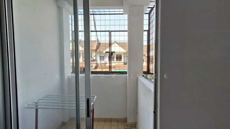 Room features: white painted walls, tile flooring, metal window grills, glass sliding door, laundry rack, natural light from windows; view: city.