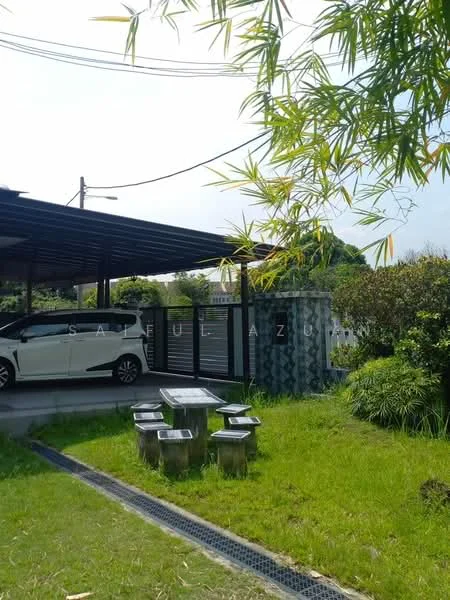 Exterior type: car porch; features: covered car porch, white sedan car, manicured lawn, tropical landscaping, bamboo plants, stone-paved walkway, garden seating area with stone tables, hedge plants; style: modern.