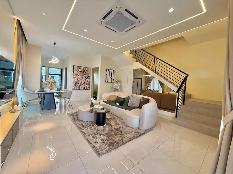 Living features: sofa in cream fabric, area rug with geometric pattern, coffee table in black, wall-mounted TV, recessed LED downlights, ceiling-mounted air conditioning unit, large windows with sheer curtains, decorative wall art, open-plan layout, grey accent wall, dining table for four, staircase with black metal railing; style: modern; view: city.