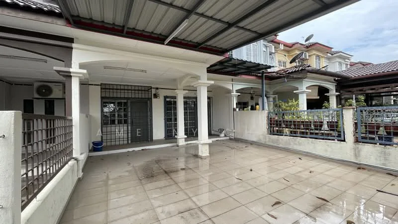 Exterior type: linked terrace house; features: covered porch area, tiled flooring, metal roof, grill gate, white painted walls, columns supporting the roof, surrounding fencing, outdoor space with drainage, adjacent residential buildings; style: modern.