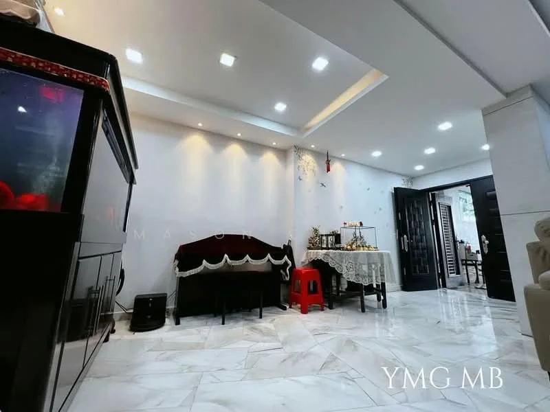 Room features: white painted walls, marble flooring, recessed downlights, decorative wall decals, black furniture, red plastic stool, fish tank, dining table visible in background; style: modern.