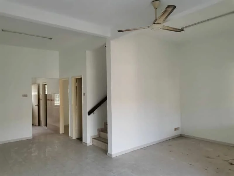 Living features: white painted walls, tile flooring, 5-blade ceiling fan, staircase leading to upper floor, natural light from windows, open layout, no visible furniture, neutral color scheme; style: modern. Room features: doorway leading to kitchen, doorway leading to other rooms.