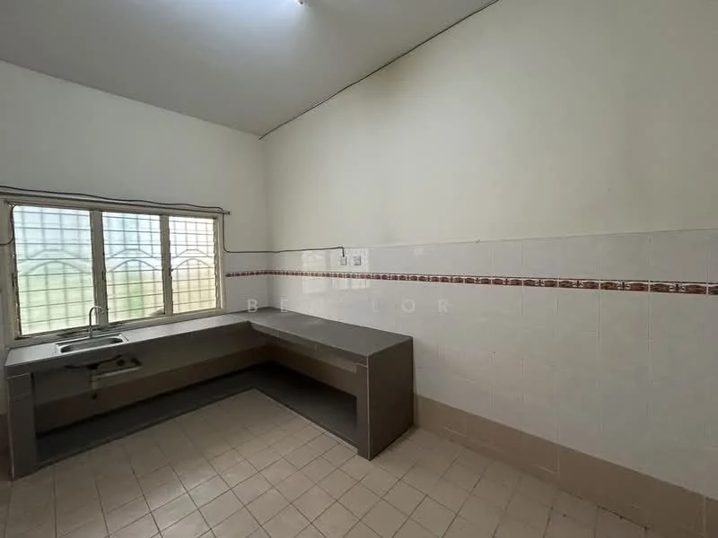 Kitchen features: single-bowl stainless-steel sink, chrome pull-down faucet, grey laminate countertop, white tiled walls, decorative tile border, light beige floor tiles, window with grid pattern, built-in cabinetry, open layout.