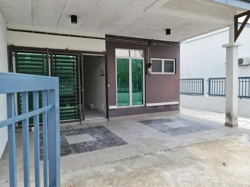 Exterior type: linked terrace house; features: grey tiled flooring, white painted walls, green metal grilles, large glass sliding door, window with white frame, concrete porch, manicured lawn, fence with vertical bars, exposed concrete wall, air conditioning unit visible; style: modern.