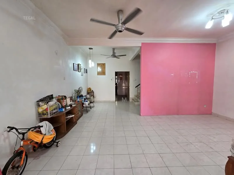 Living features: white painted walls, pink accent wall, ceramic tile flooring, 5-blade ceiling fan, recessed downlights, open shelving unit, bicycle, seating area, staircase in background.