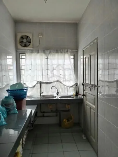 Kitchen features: single-bowl stainless-steel sink, chrome pull-down faucet, grey tiled walls, white tiled flooring, window with sheer curtains, exhaust fan, grey countertop, built-in cabinetry, plastic storage basket, plastic bags.