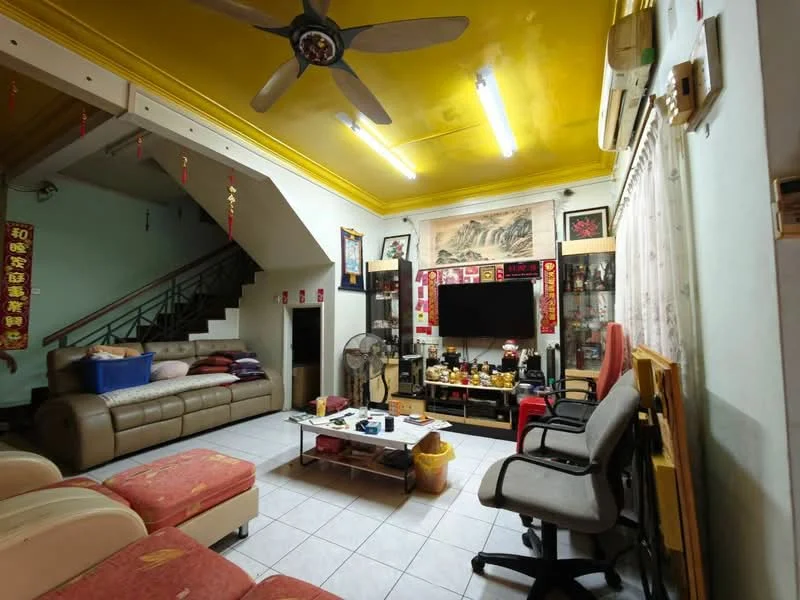 Living features: yellow painted ceiling, 5-blade ceiling fan, wall-mounted TV, light-colored tiled flooring, cream leather sofa, wooden coffee table, decorative wall art, built-in shelving unit, curtains, staircase leading to upper floor, multiple seating chairs, decorative items on shelves; style: traditional.