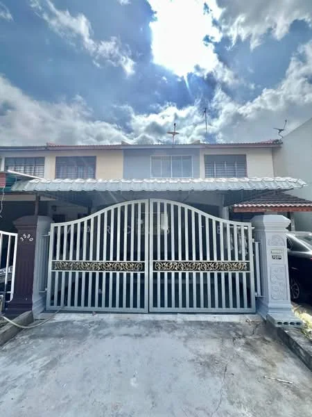 Exterior type: linked terrace house; features: white painted facade, double-storey, metal gate with decorative design, tiled roof, driveway with concrete surface, front porch area, two windows on the upper floor, two windows on the ground floor; style: modern.